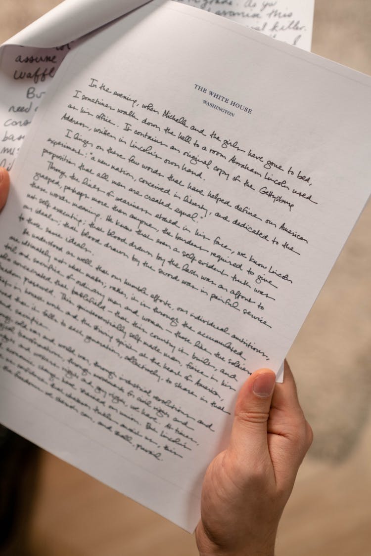 Person Holding A Handwritten Letter