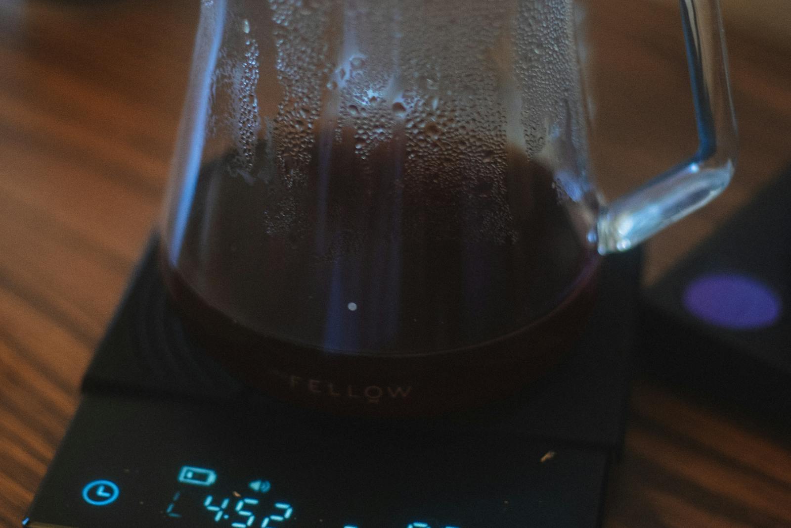 Digital scale on counter showing weight and timer style display