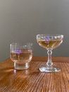 Glasses with champagne placed on table