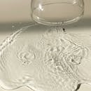 Inverted wineglass near spilled water