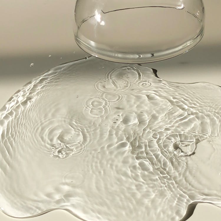 Inverted Wineglass Near Spilled Water