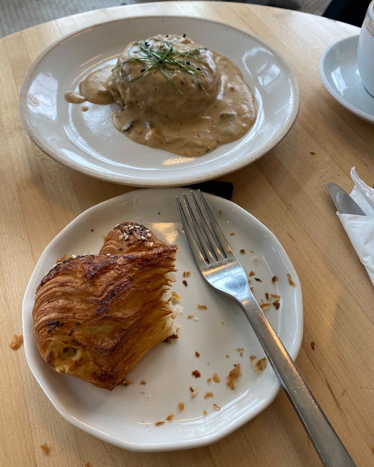 Appetizing Meat With Mushroom Sauce And Pie Served On Table