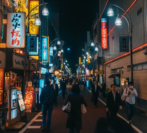 Photo of a Busy Street During Night
