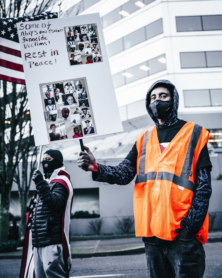 Multiethnic People With Banners Protesting Against Genocide