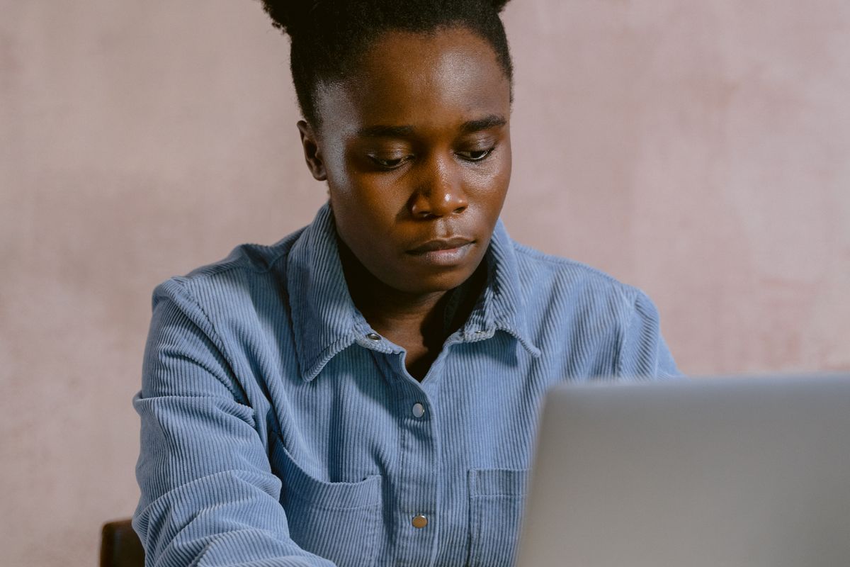 Developer focused on coding at workstation