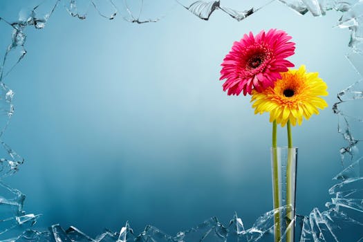 Yellow and Pink Flowers View Behind Broken Glass