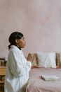 Woman in White Jacket Praying