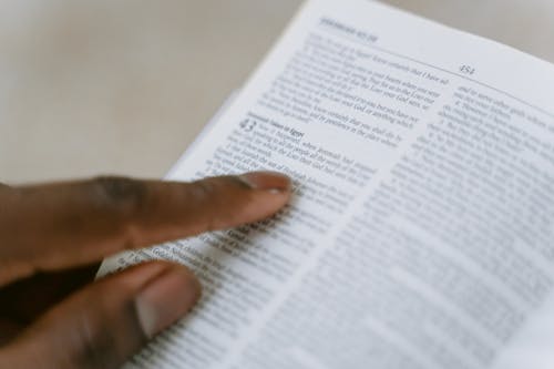 Free Person Holding Holy Bible  Stock Photo