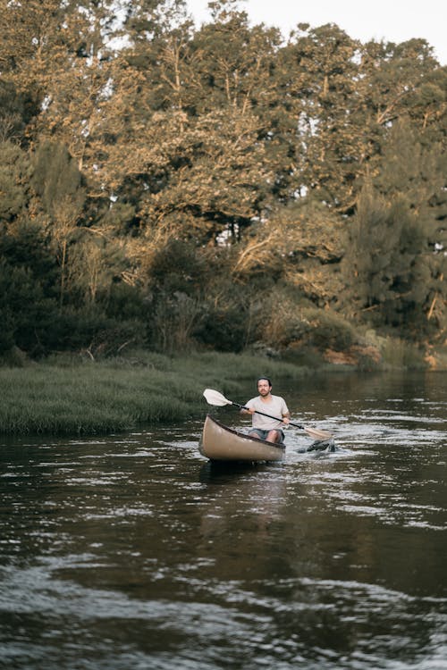 Photograph of a Man Kayaking