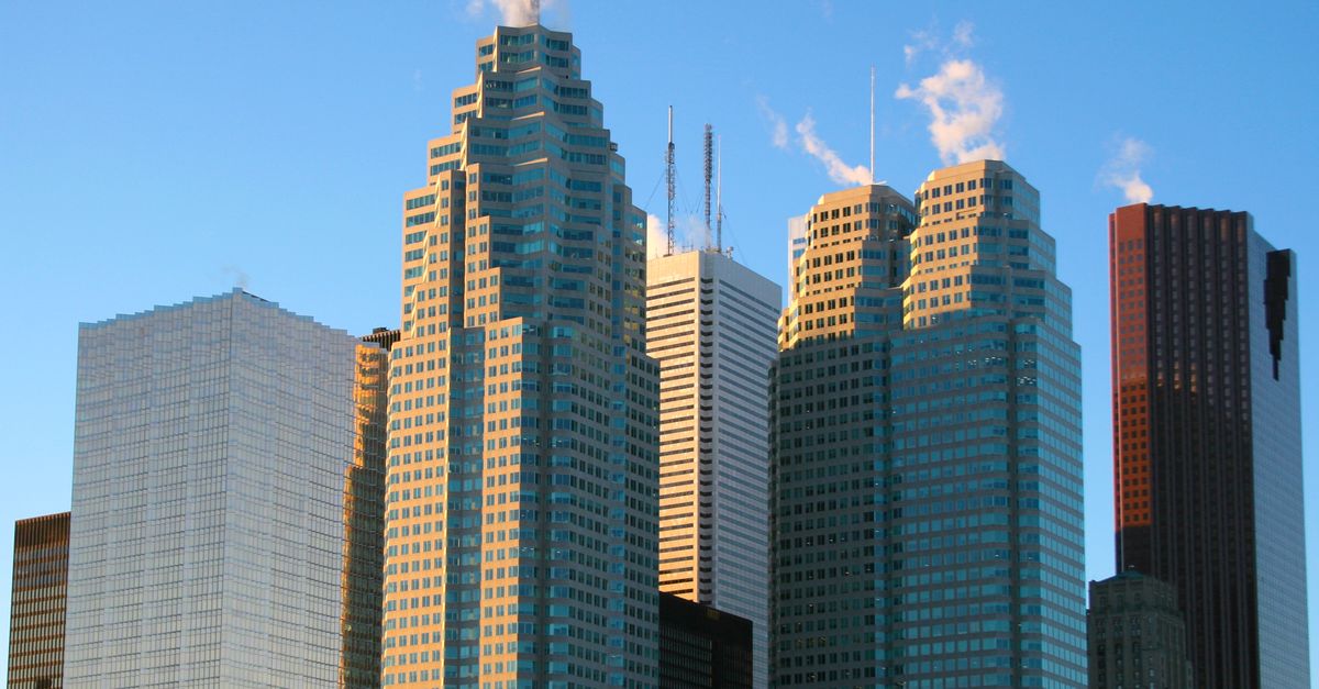 Office towers in Toronto's financial district, where Bank of Canada rate decisions reach mortgage pricing