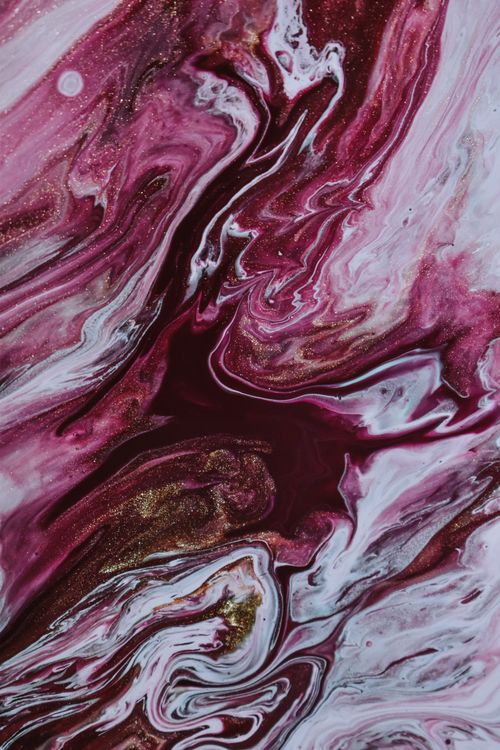 Free From above of abstract backdrop representing oil artwork with curved pink and white flows with swirls Stock Photo
