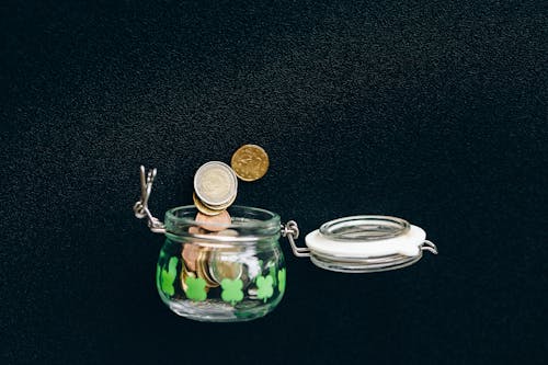 Free Coins In a Jar Stock Photo