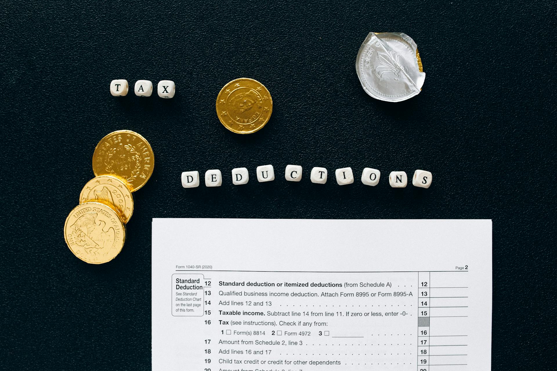 Gold Round Coins on Black Textile