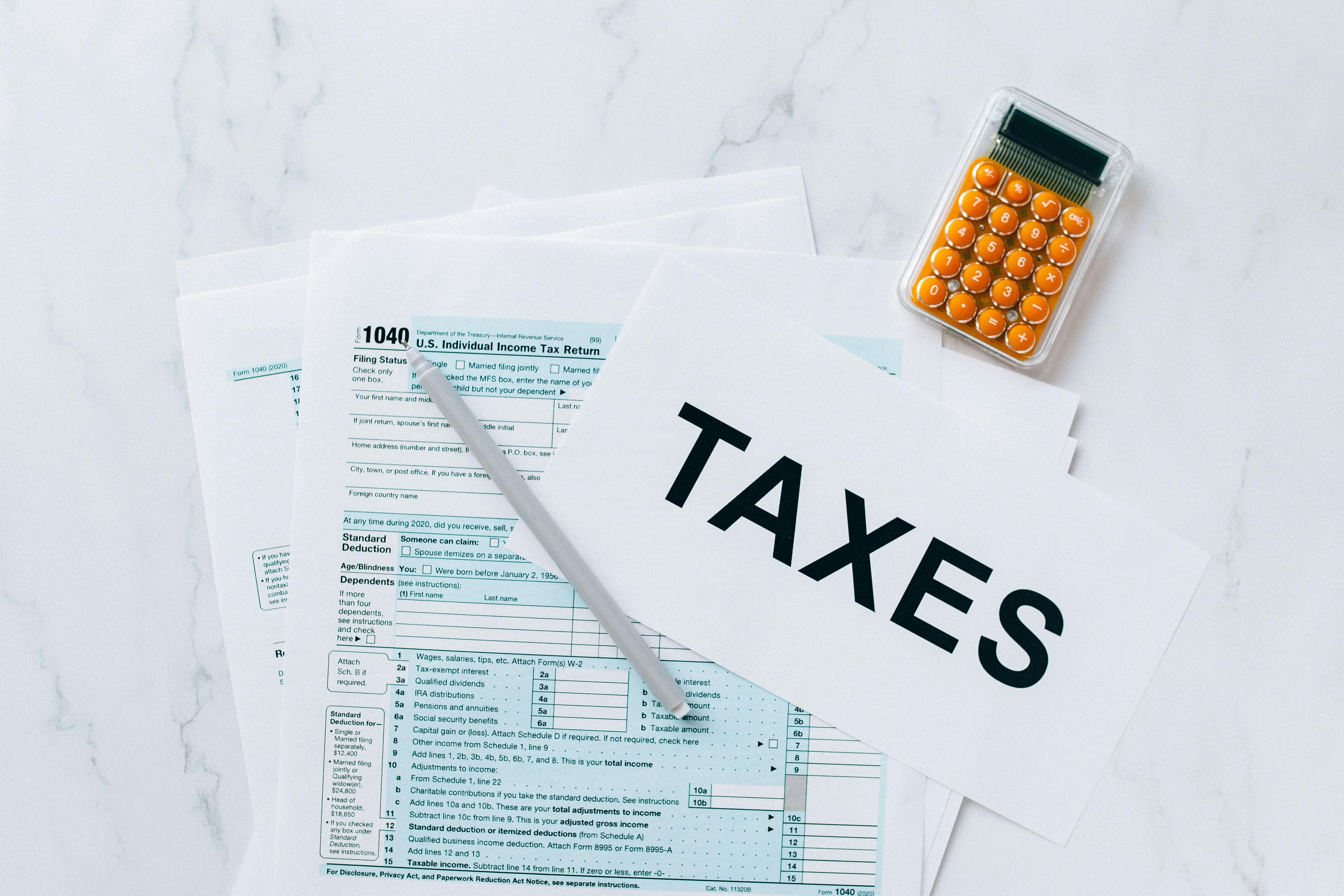 Tax Documents on the Table · Free Stock Photo