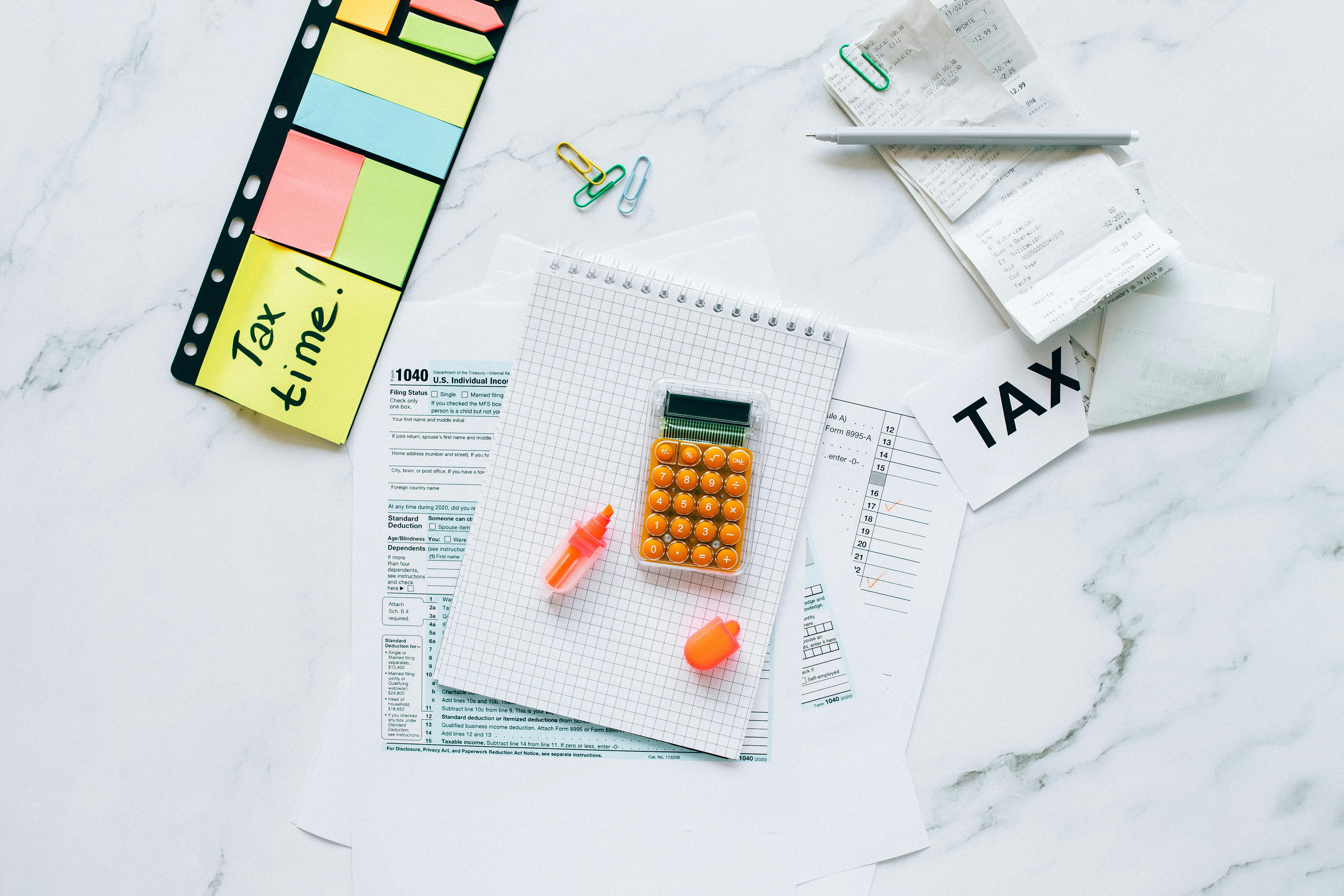 tax documents on marble table