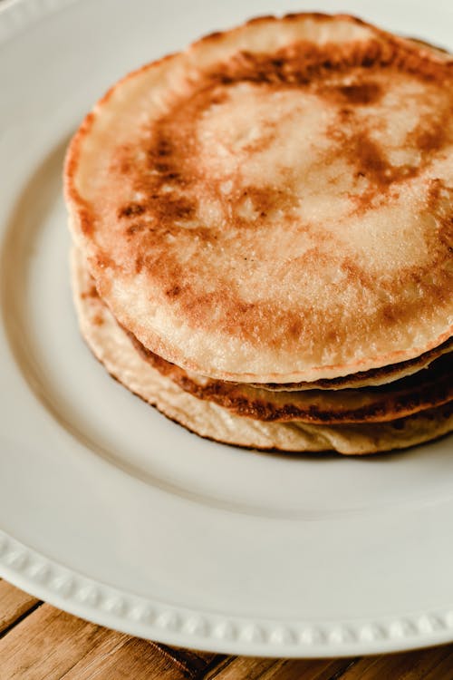 Free Pancakes on a White Plate Stock Photo