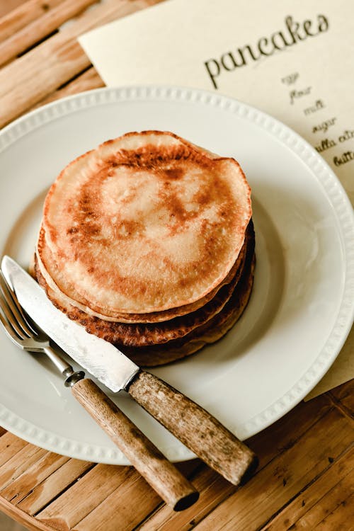 Free Pancakes on a White Plate Stock Photo