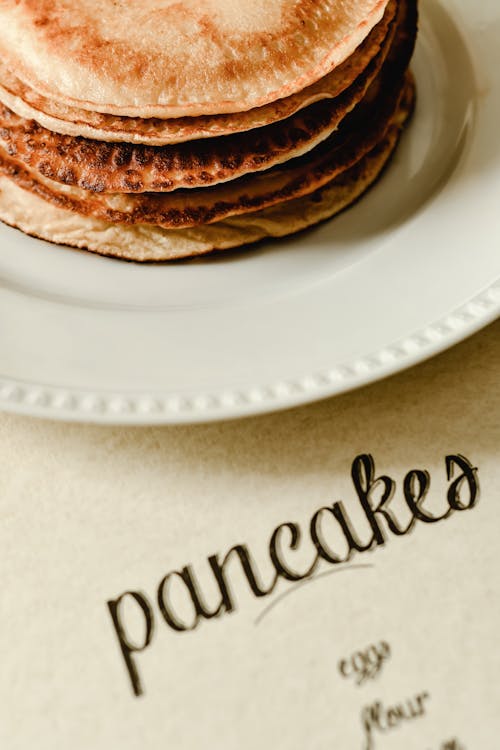 Free Pancakes on a White Plate Stock Photo