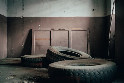 Abandoned tires in dirty room