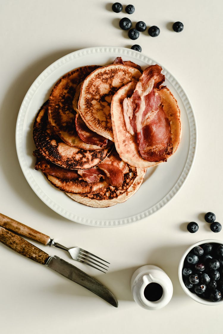 Pancakes With Bacon On A Plate