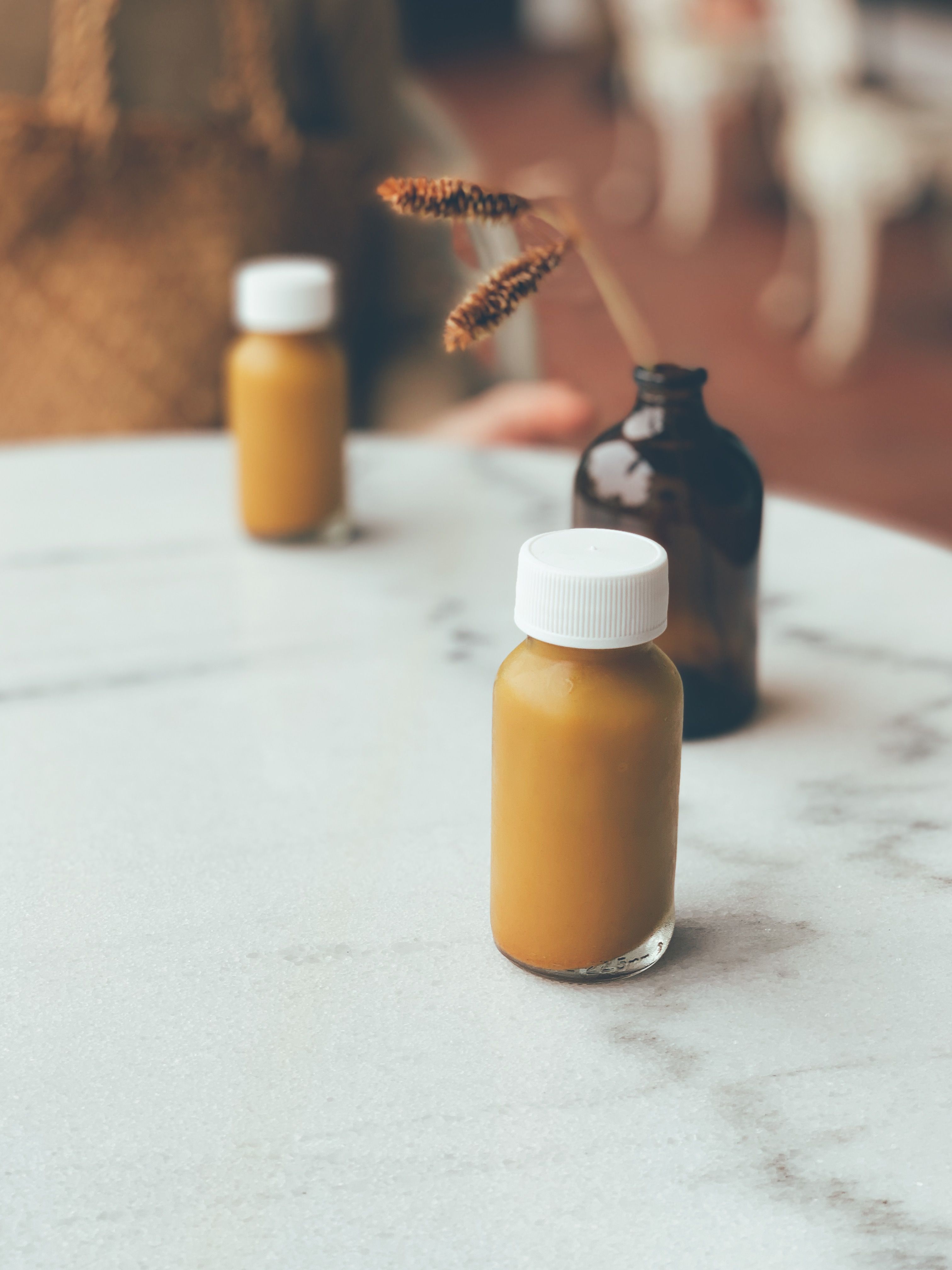 Small bottles of wellness shots on a table