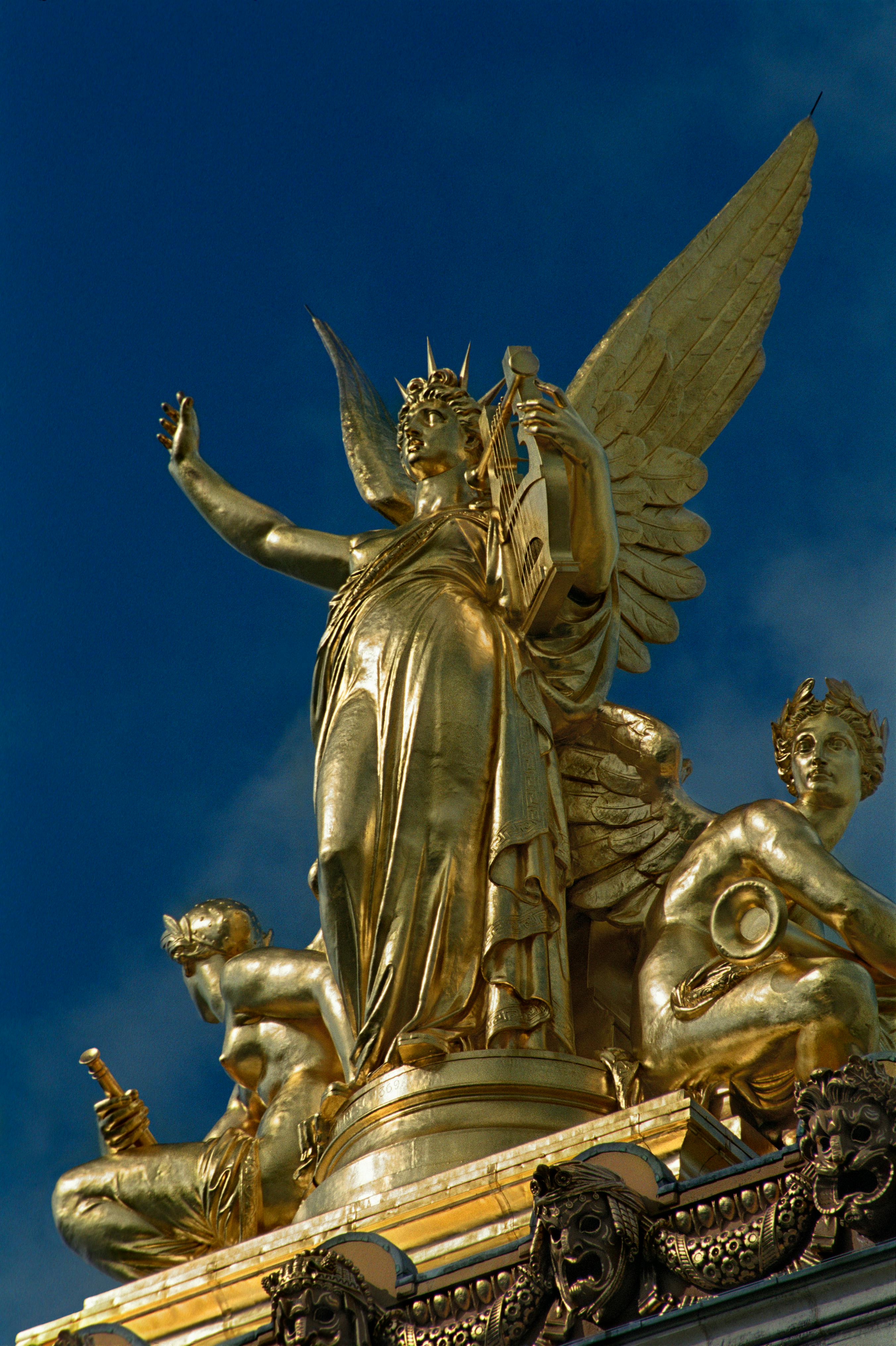 low angle shot of golden statues