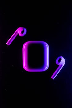 Neon-lit earpods and case on a black background, ideal for tech product showcases.