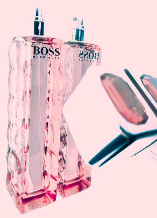 Foto stok gratis beriklan, berwarna merah muda, botol parfum