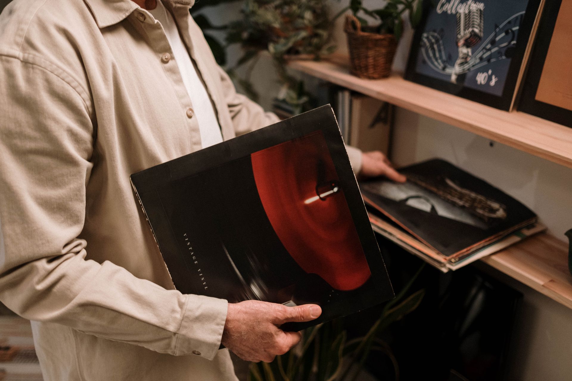A Person Holding a Vinyl Record