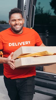 Friendly courier in a red shirt delivering packages from a van, showcasing efficient delivery service.