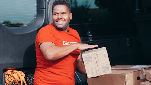 Free A Man Making a Delivery Stock Photo