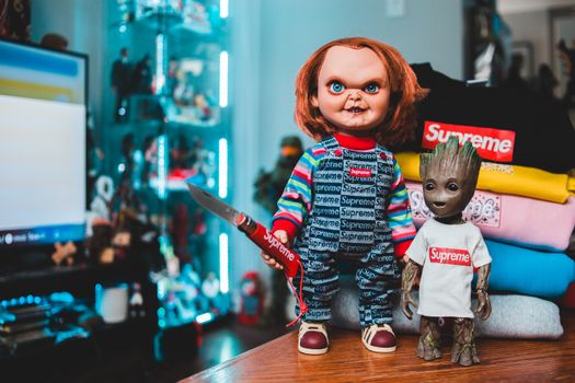 Chucky Doll and Groot Dressed in Supreme Clothing 