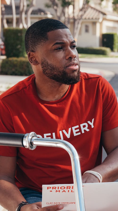 Man in Red and White Nike Crew Neck T-shirt