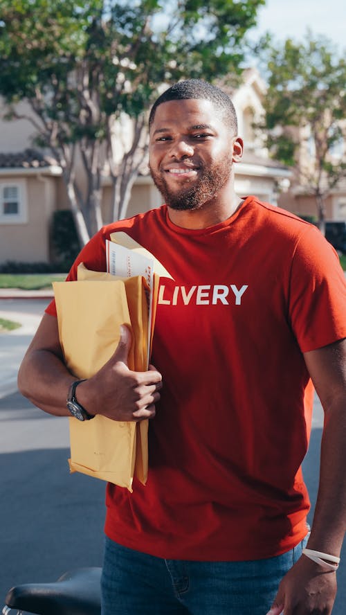 Gratis stockfoto met Afro-Amerikaanse man, bestelling, documenten