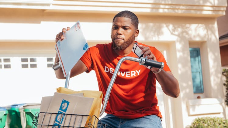 Delivery Man On A Bicycle