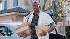 Man in White Button Up Shirt Delivering Packages