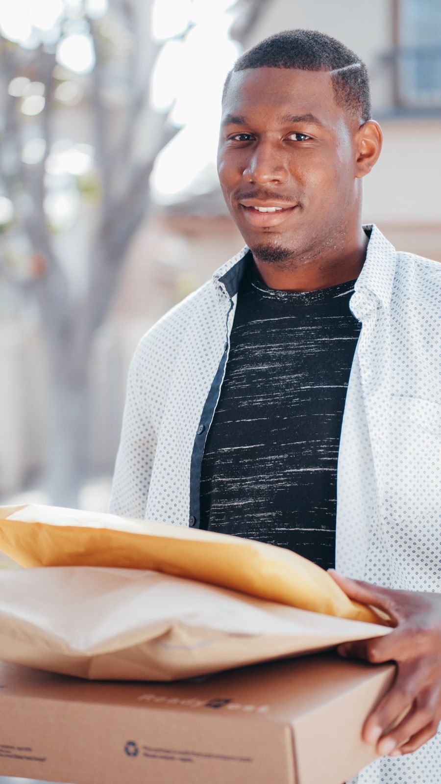 Courier moving quickly with packages for fast delivery