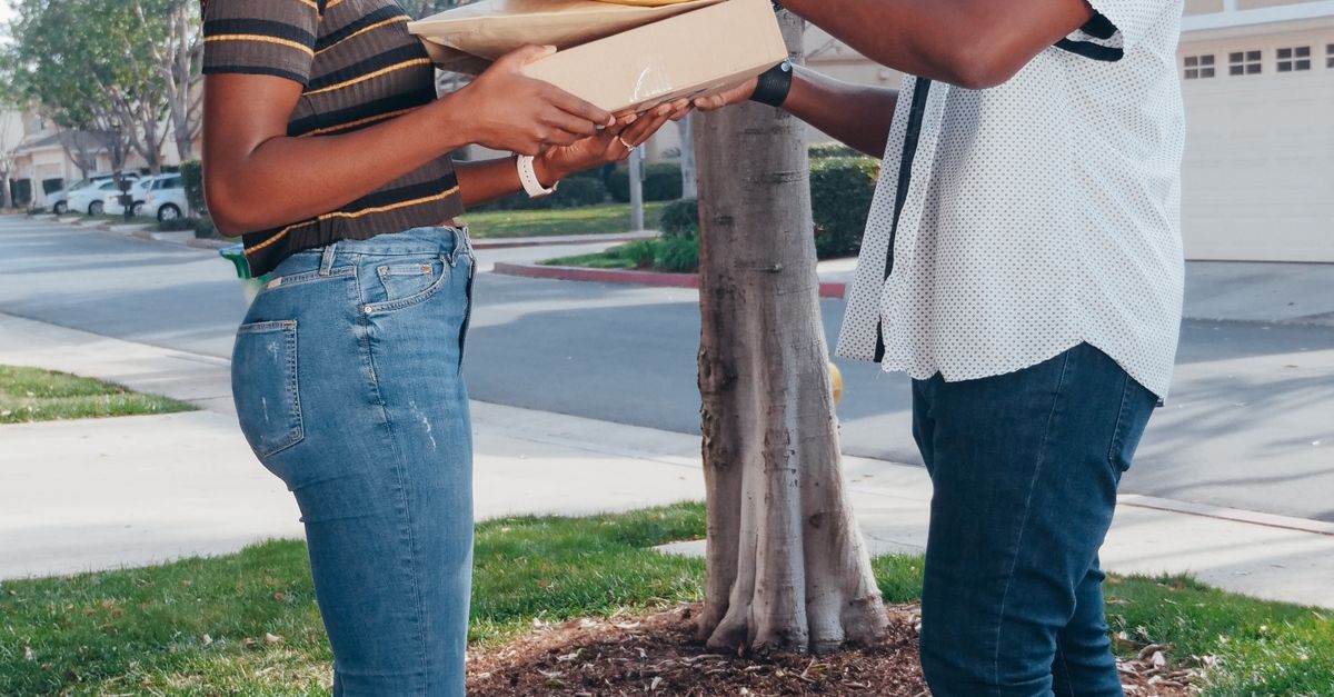 Hand Over Hand Pac Man Handing Over Packages · Free Stock Photo