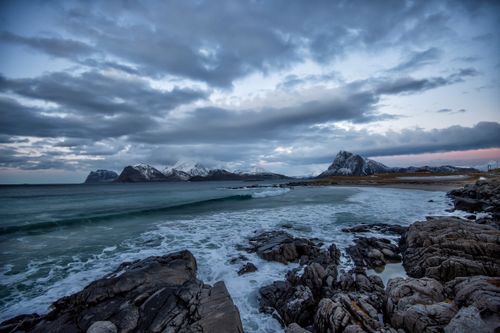 Free Explore the rugged coastlines and majestic mountains of Nordland, Norway, captured under a dynamic sky. Stock Photo