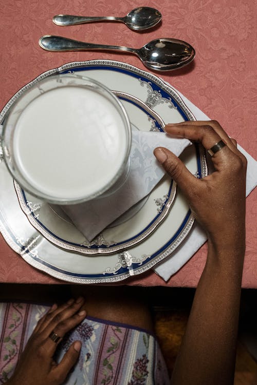 Free Person Holding White Ceramic Round Plate Stock Photo