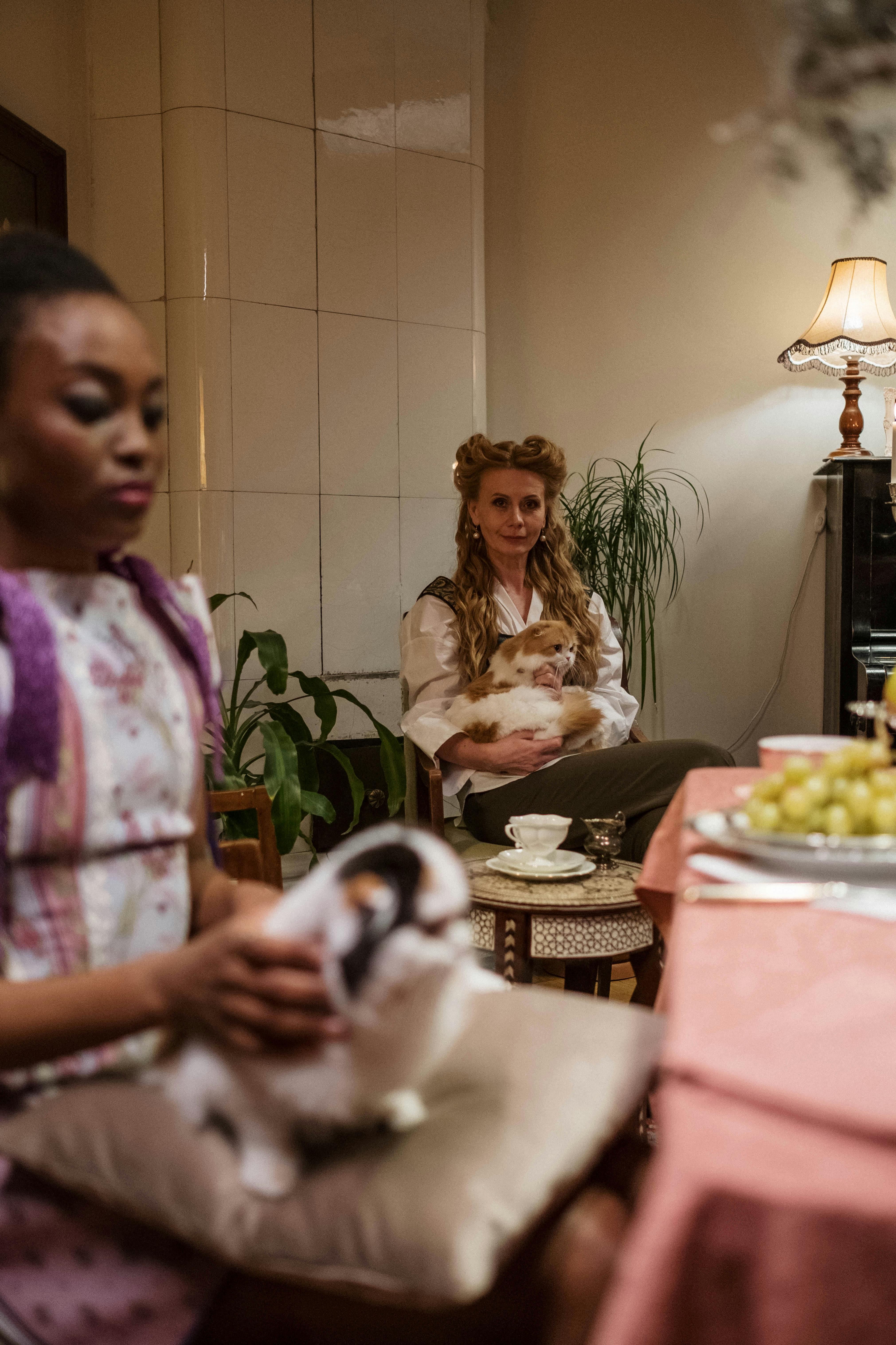 Women with Their Pet Cats