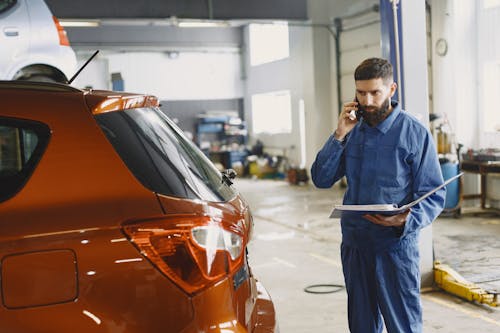 Ilmainen kuvapankkikuva tunnisteilla autotalli, mekaanikko, mies