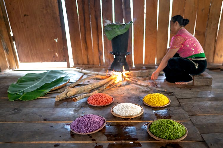 A Woman Cooking Traditional Food