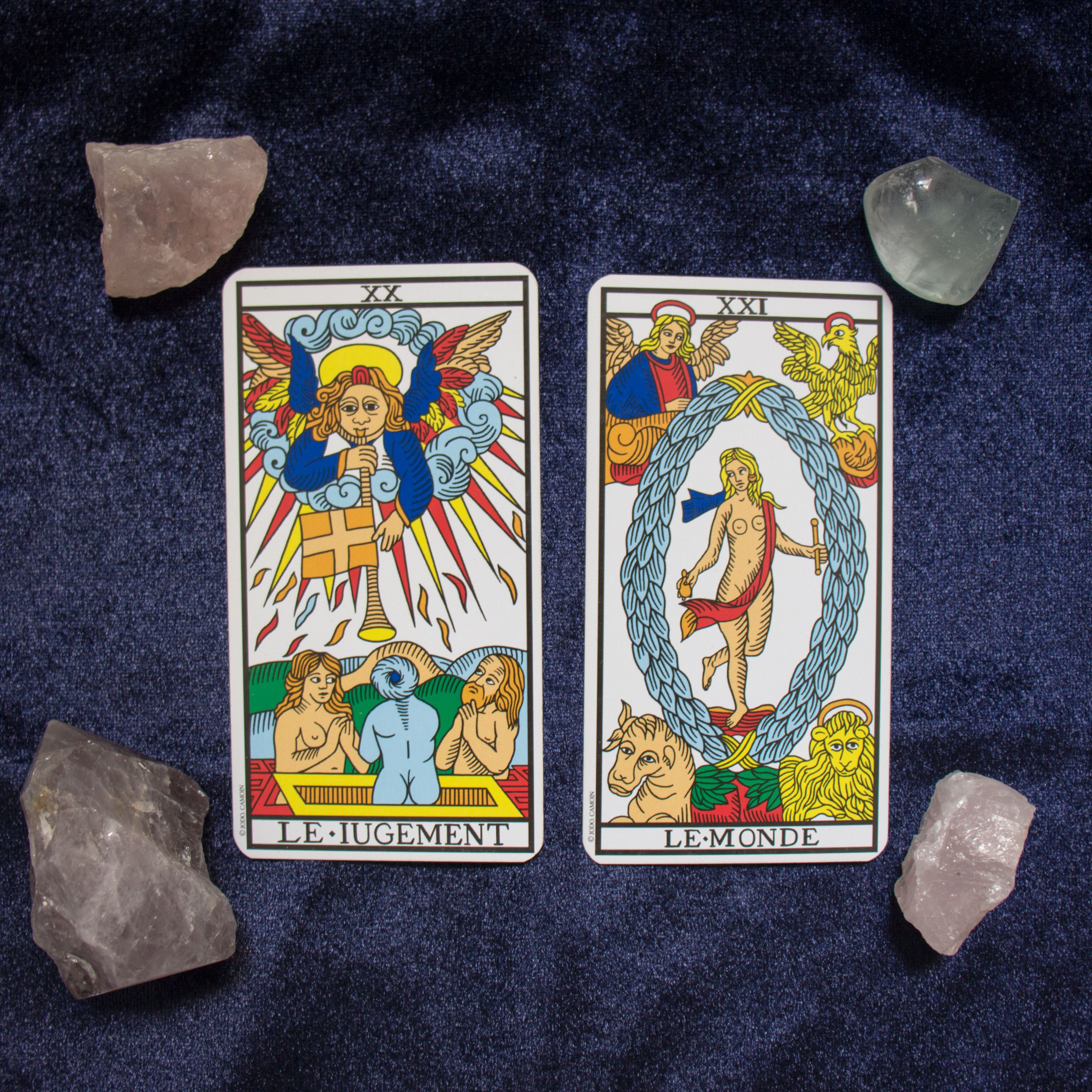 Tarot Cards and Healing Crystals on Black Fabric