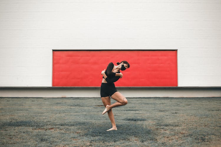 Slim Dancer Wearing Medical Mask On Street