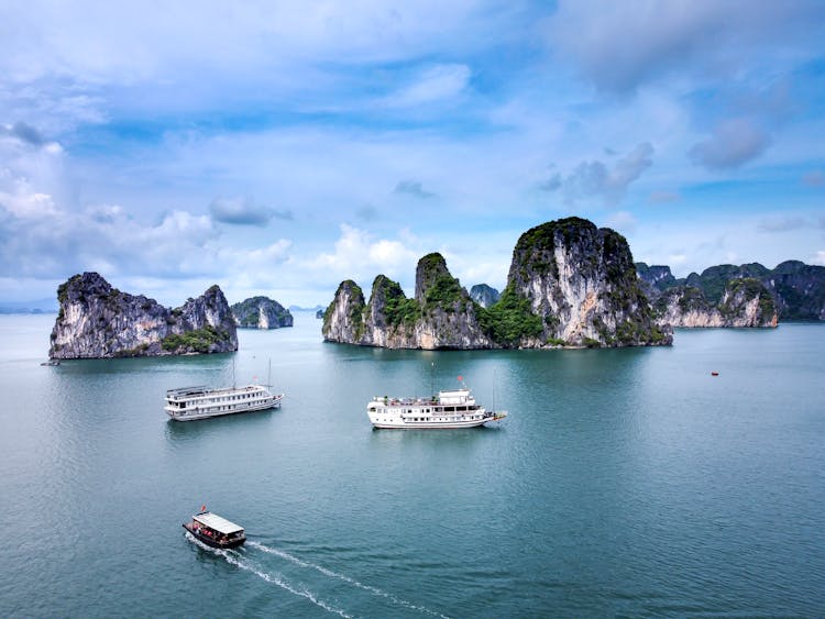 Cruise Ships On The Sea Among Rock Formations