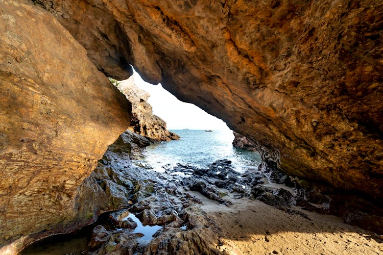 Grotto On Seashore