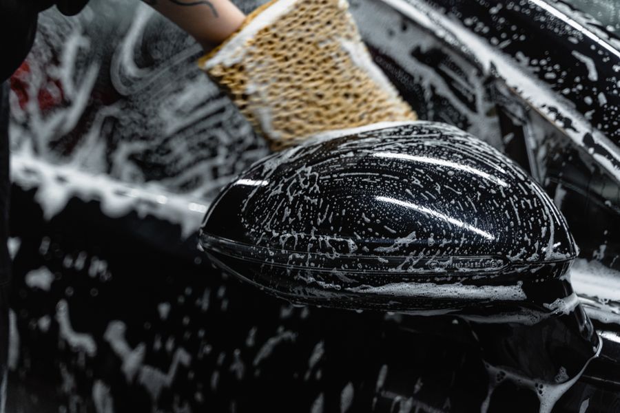 Professional automotive technician working on a vehicle