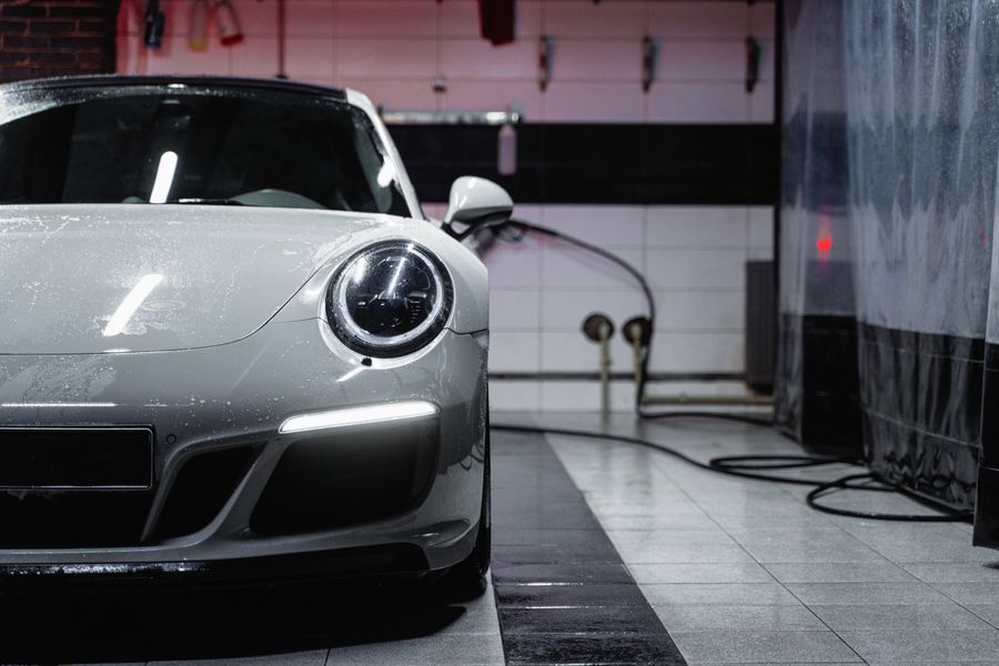 Premium car displayed in a modern automotive studio