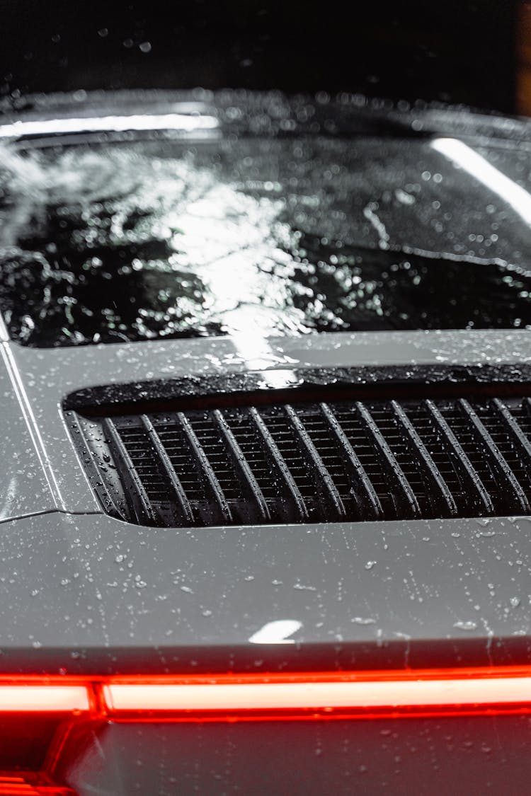 Photo Of A Wet Car While Doing Carwash
